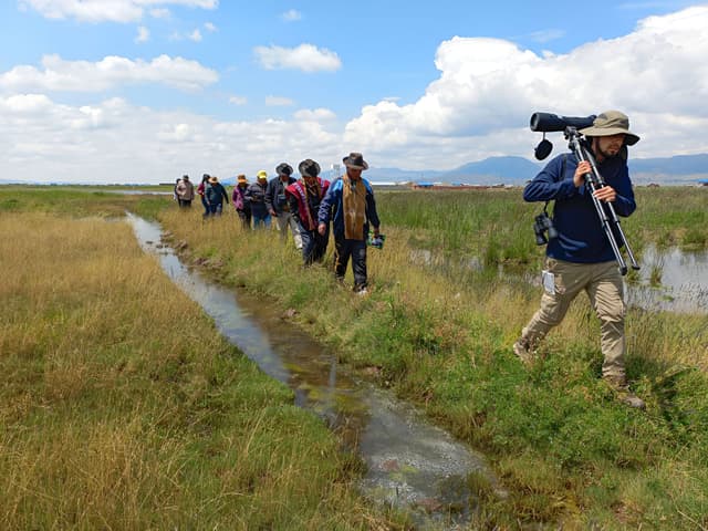 Image of people working in collaboration with communities.