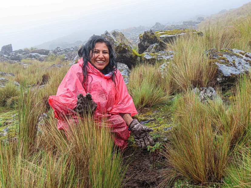 Image of a cheerful person on a hill.