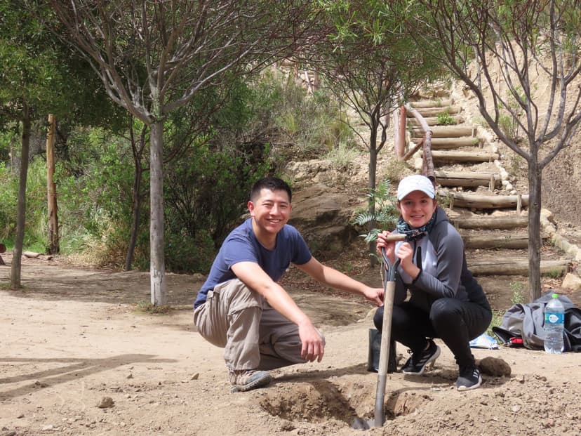 Image of two people in a park.